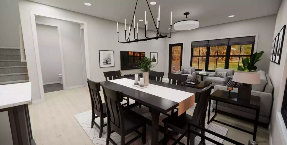 Wrought Iron Candle Chandelier Anchors This Dining and Living Room Duo