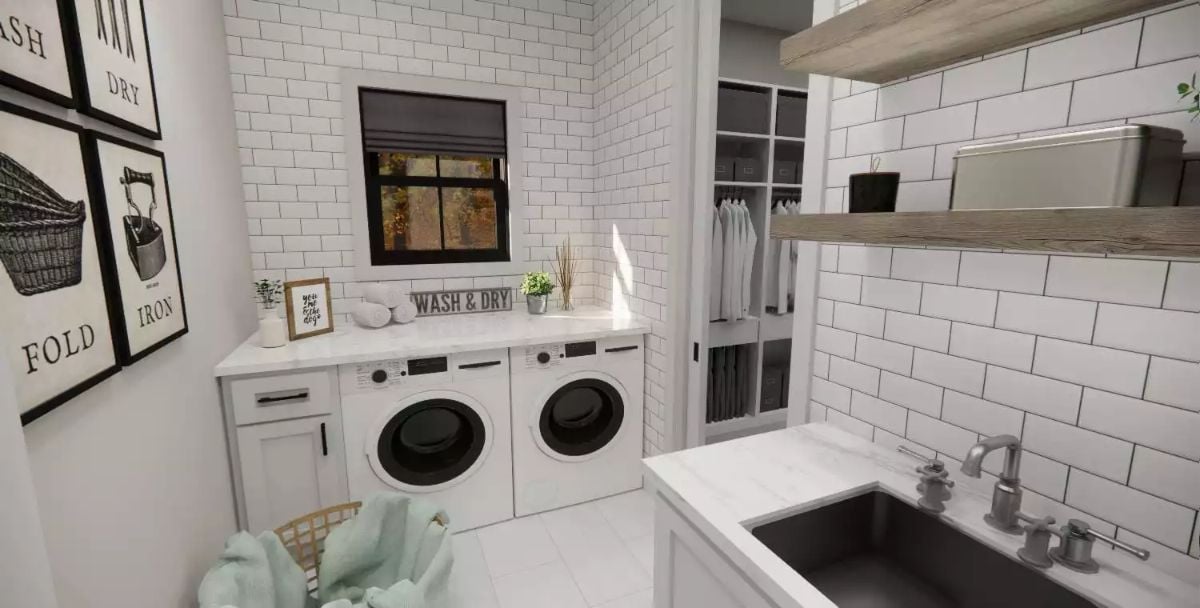 Subway Tile Walls and Built-In Cabinetry Make This Laundry Room Work Hard