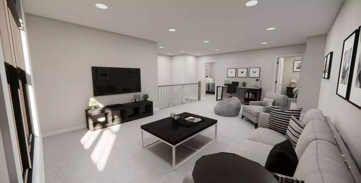 Recessed Lighting and Carpet Anchor This Upstairs Loft Living Area