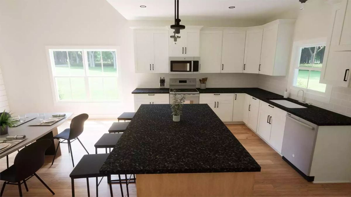 Black Granite Island Anchors a White Shaker Kitchen with Hardwood Floors