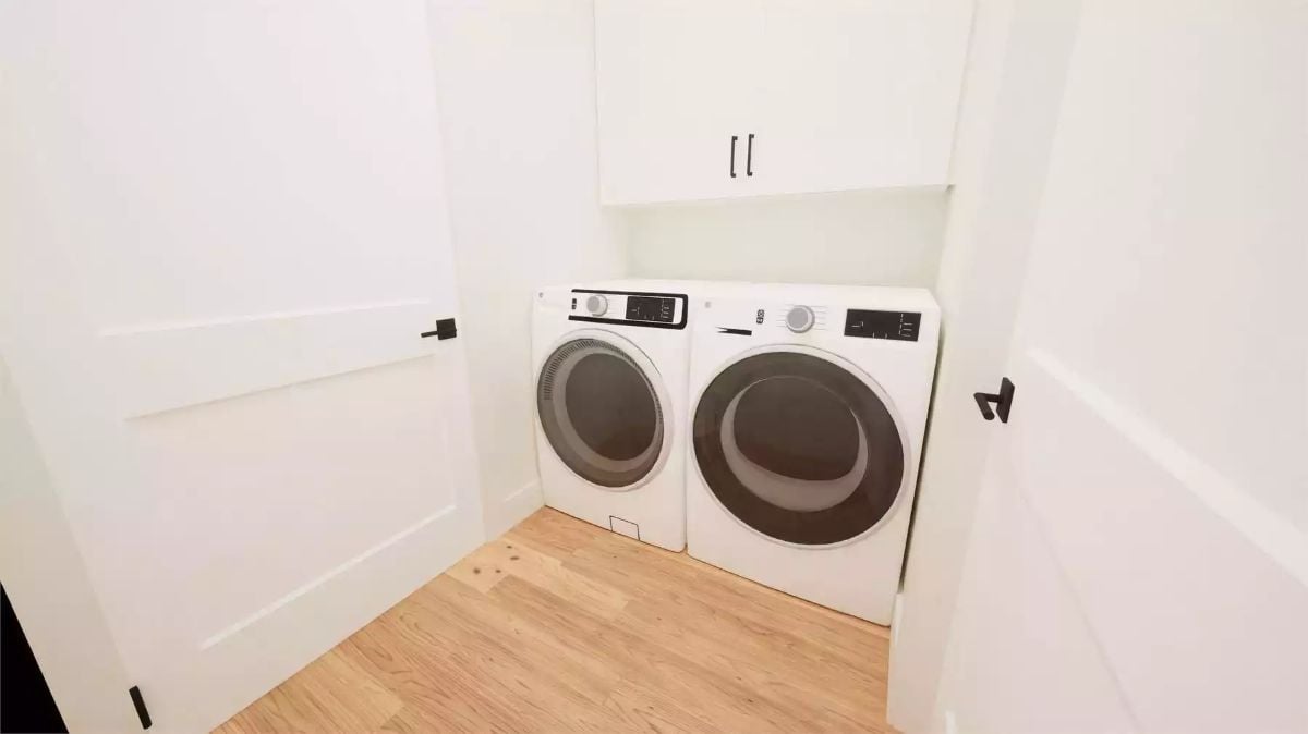 Front-Load Laundry Closet with Cabinet Storage Above