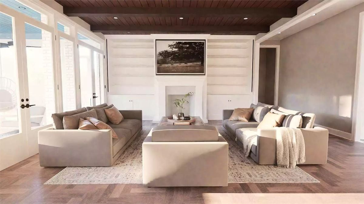 Paired Sofas and a Shiplap Fireplace Wall Give This Living Room Its Quiet Authority