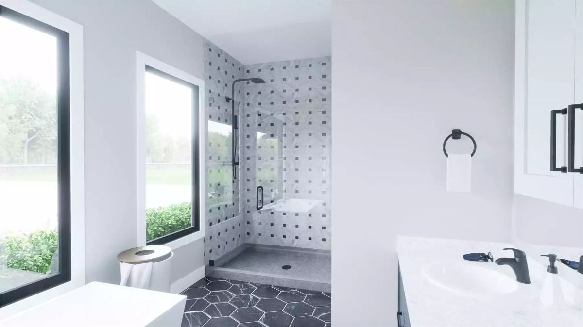 Patterned Tile and Matte Black Fixtures Carry This Shower From Functional to Considered