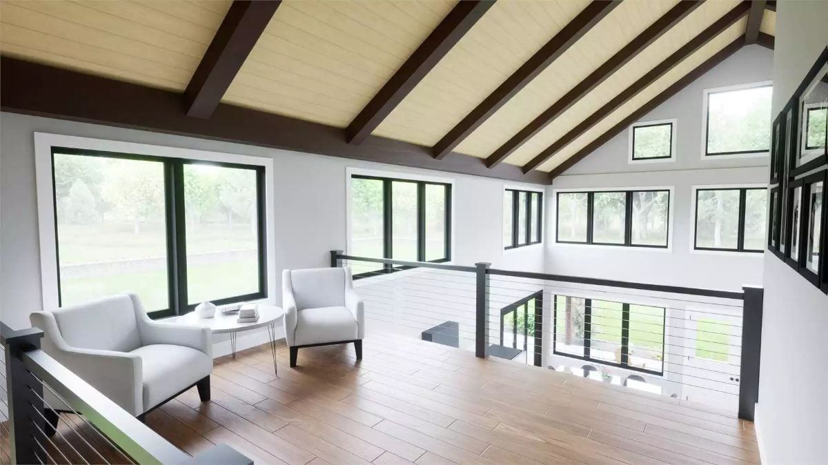 Vaulted Loft Sitting Area Floats Above the Main Floor on Open Cable Rails