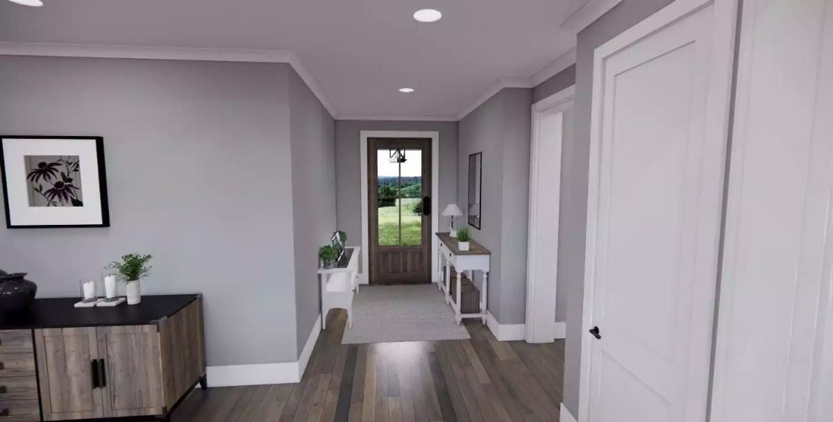 Warm Wood Tones and Gray Walls Set the Tone in This Foyer