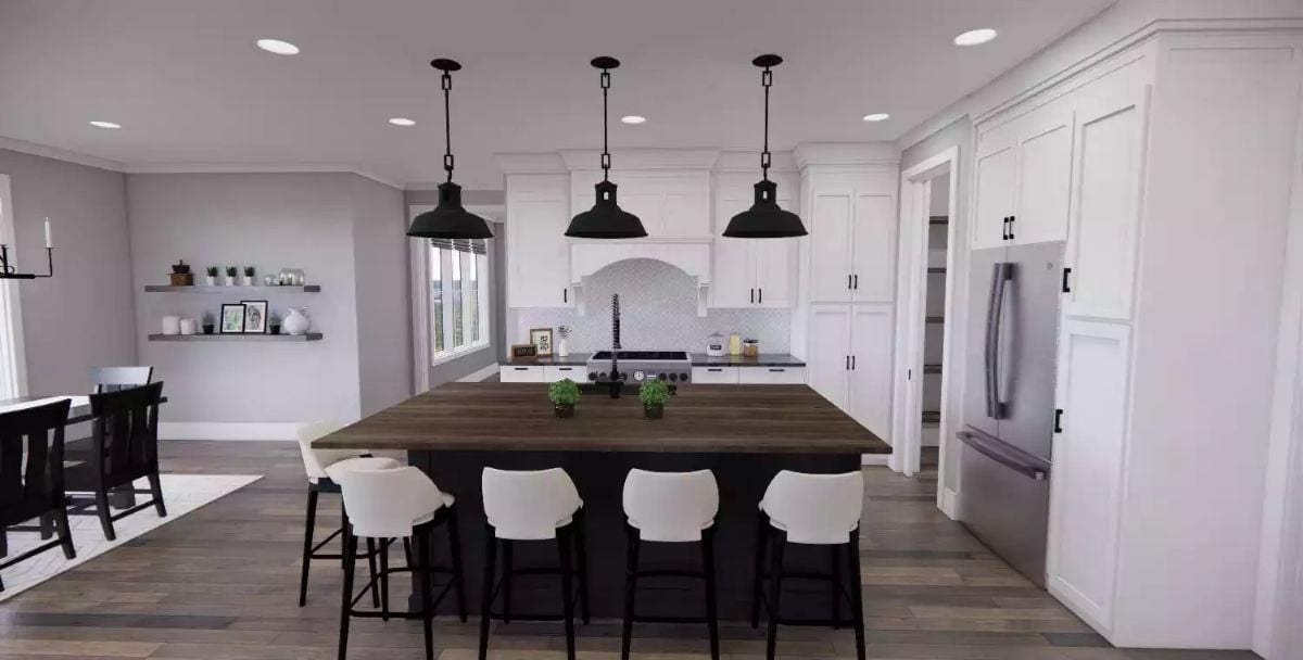Black Pendants and a Wood Island Top Ground This Open-Concept Kitchen