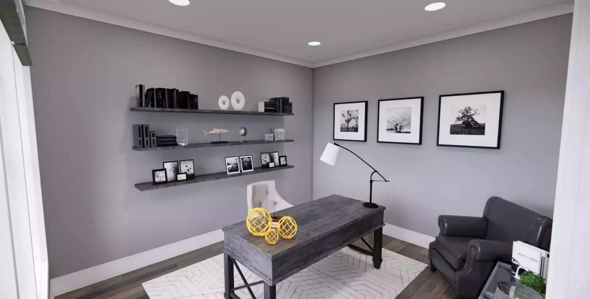 Bold Yellow Accents and Black-Framed Art Give This Home Office Its Edge