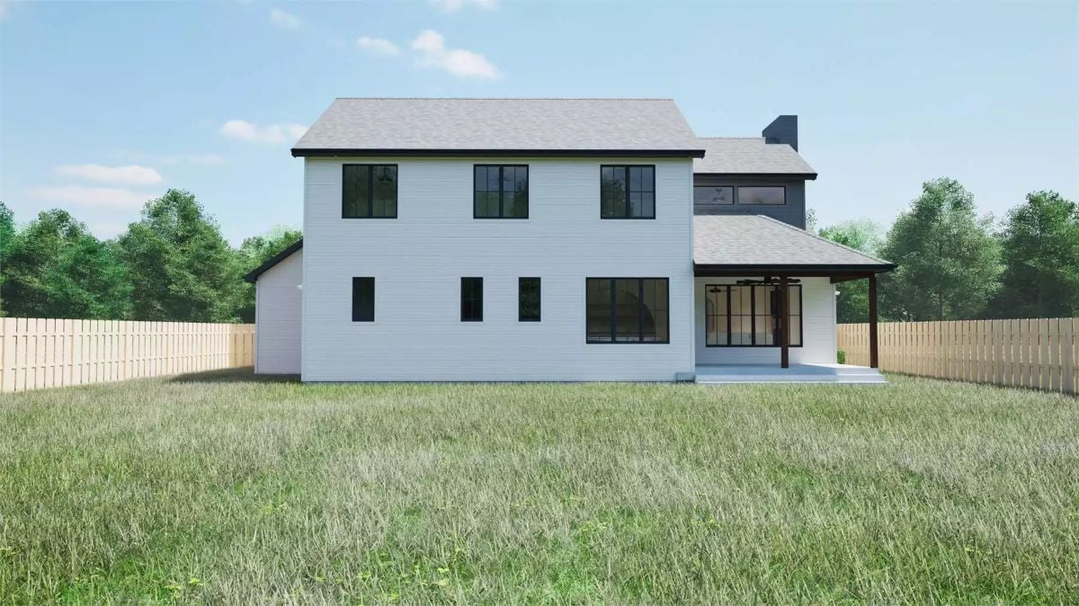 Rear Elevation Shows Clean White Siding Against a Covered Porch Addition