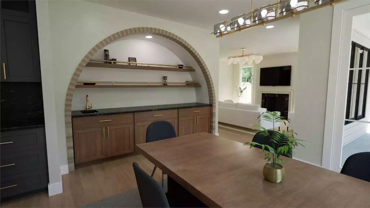 Arched Brick Nook Frames a Wet Bar with Walnut Cabinets and Gold Hardware