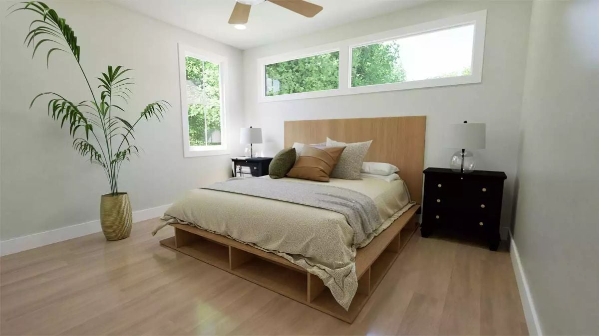 Natural Wood Platform Bed Anchors a Calm Primary Bedroom with Built-In Storage Below