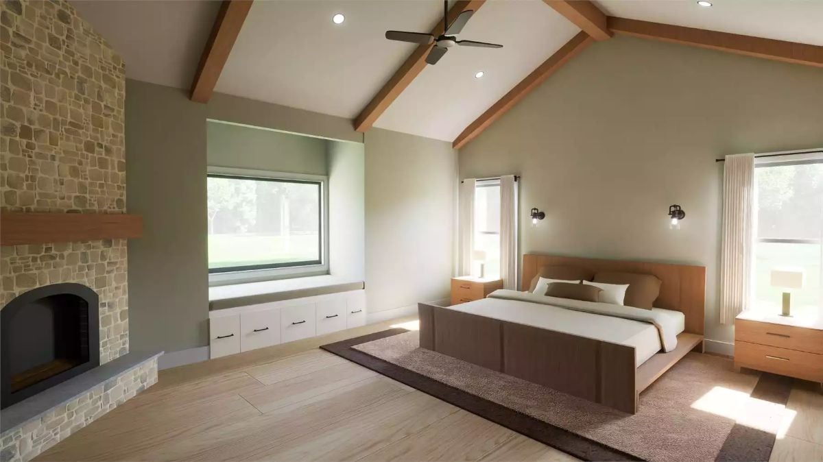 Vaulted Master Bedroom Pairs Fieldstone Fireplace with Warm Wood Ceiling Beams