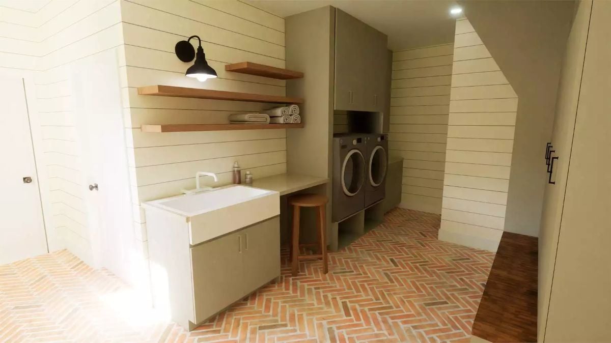 Herringbone Brick and a Farmhouse Sink Give This Laundry Room Real Purpose