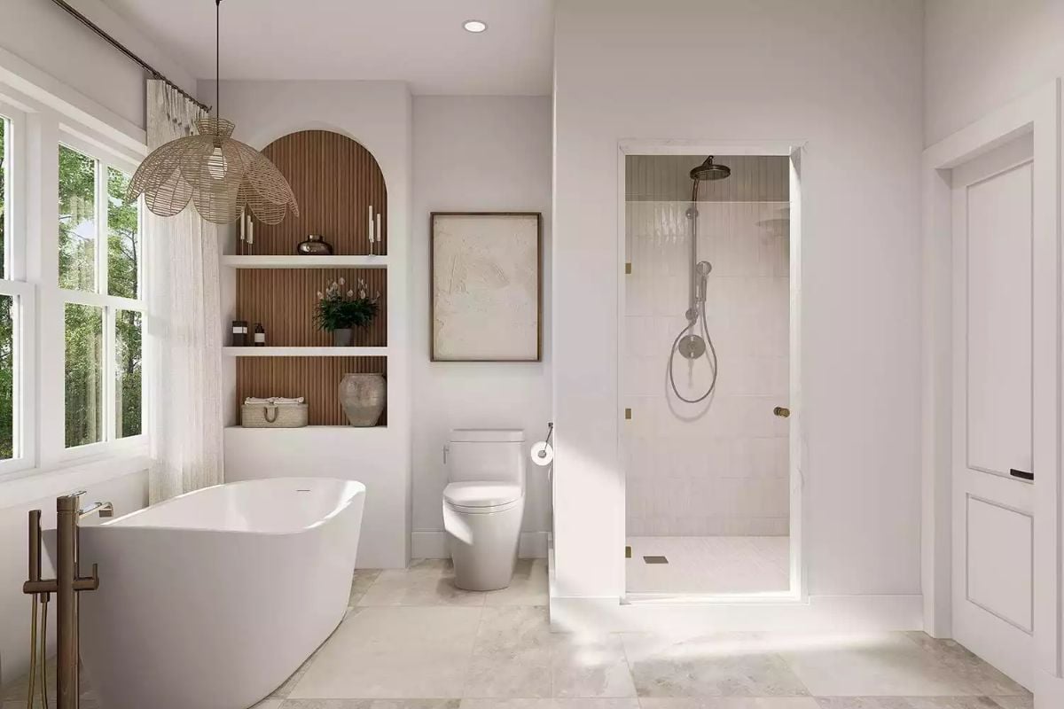 Arched Wood Niche and Freestanding Tub Give This Bathroom Real Character