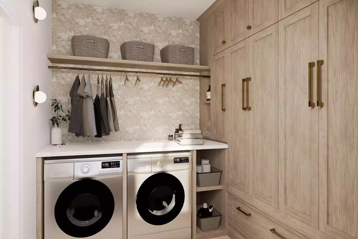 Hanging Rail, Marble Countertop, and Woven Baskets Make Laundry Feel Considered