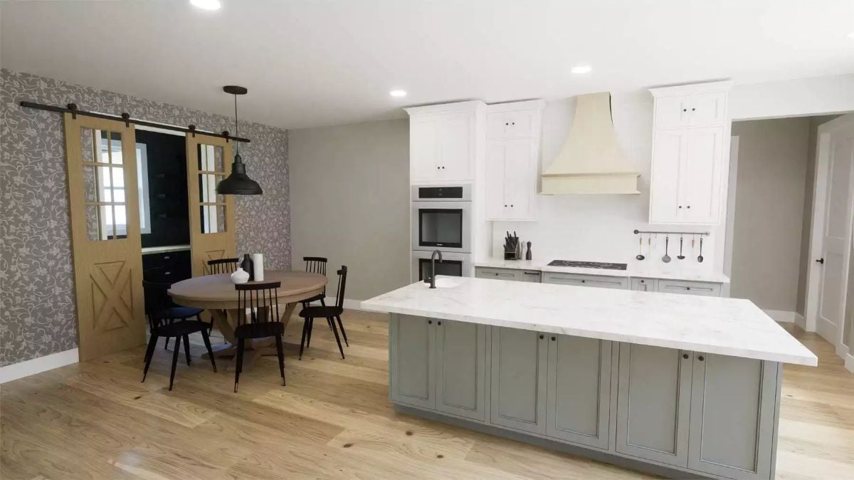 Marble-Top Island and Sage Cabinetry Bring Quiet Contrast to an Open Kitchen