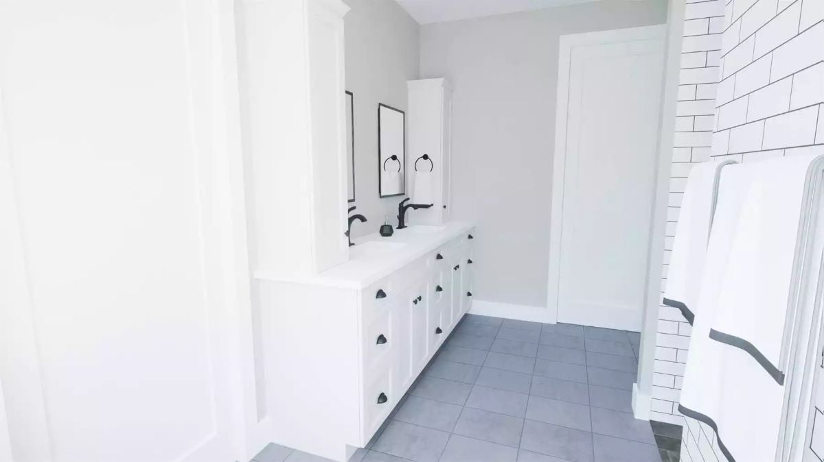 Double Vanity with Matte Black Fixtures Keeps This Farmhouse Bath Crisp and Functional