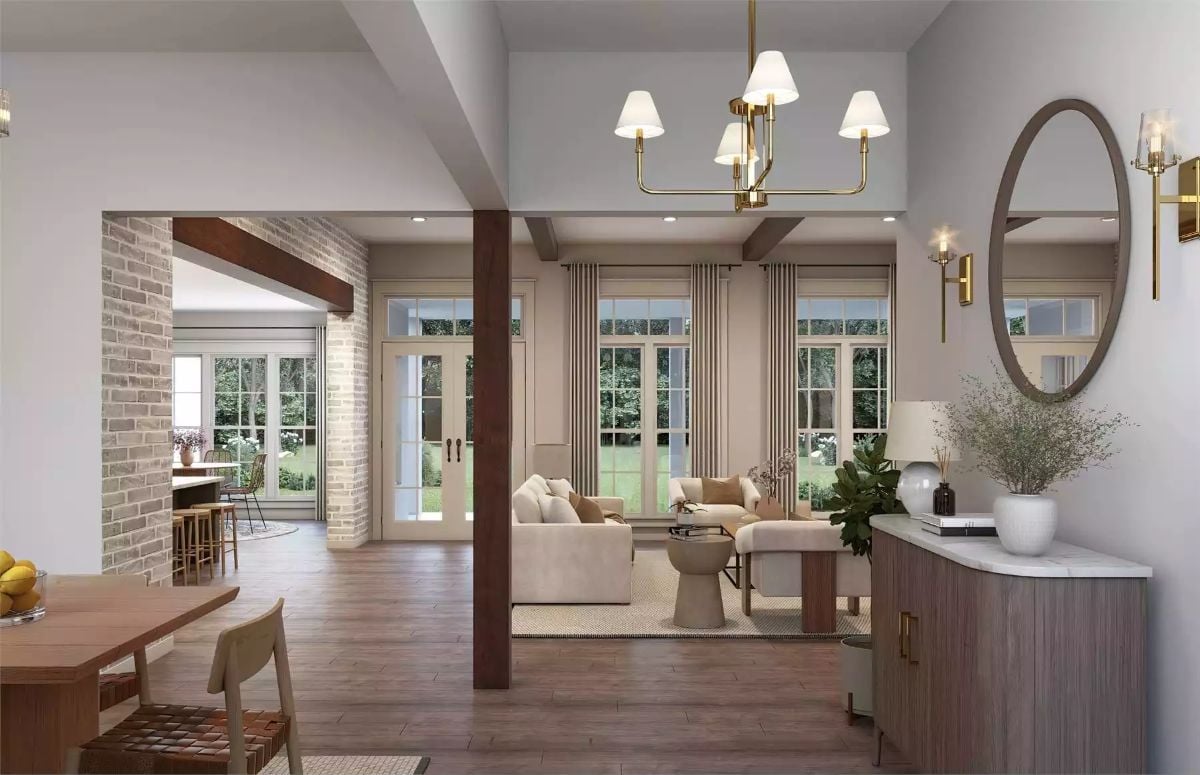 Warm Wood, Brass Fixtures, and Garden Views Pull Three Rooms Into One