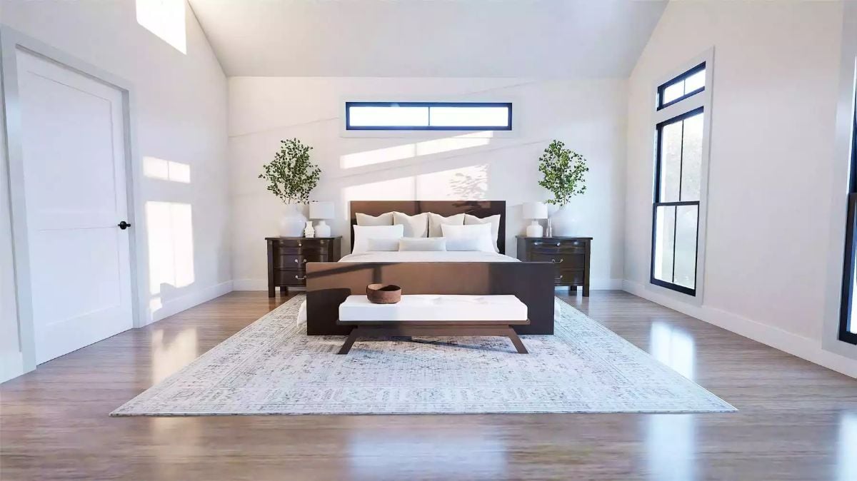 Vaulted Ceilings and Warm Wood Tones Set the Tone in the Primary Suite