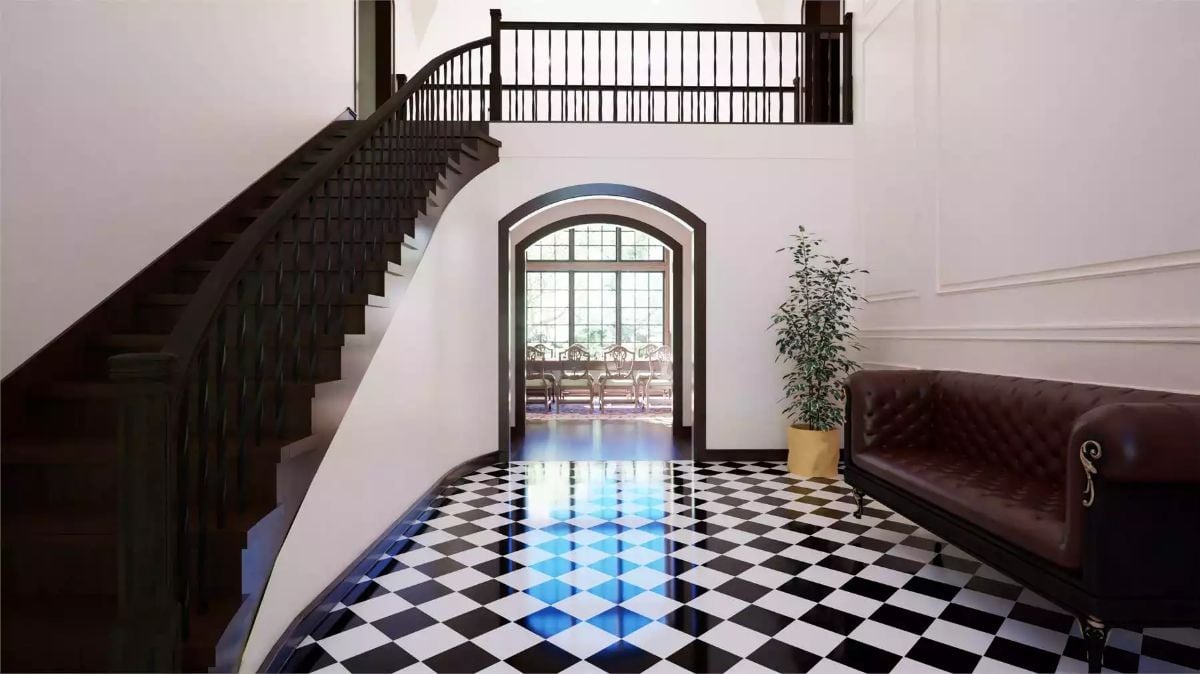 Grand Foyer with Curved Staircase and Checkerboard Marble Floor
