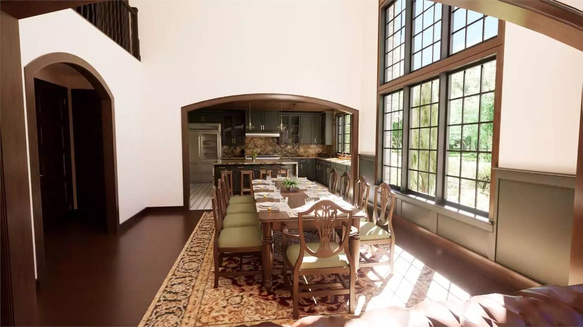 Arched Pass-Through Connects Formal Dining to a Kitchen Built Around Dark Cabinetry