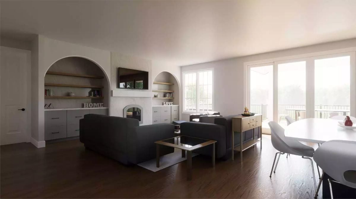 Arched Built-Ins and Dark Hardwood Ground a Light-Filled Country Living Room
