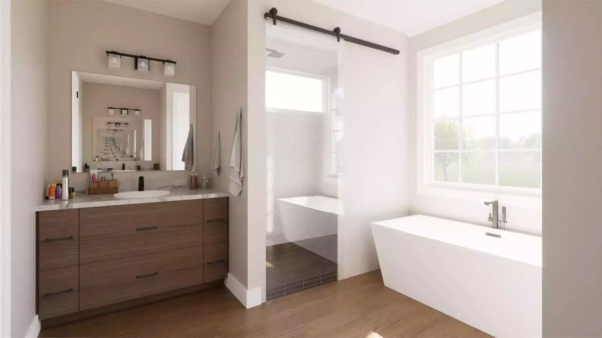 Barn Door Hardware and Warm Wood Vanity Define a Modern Country Bath