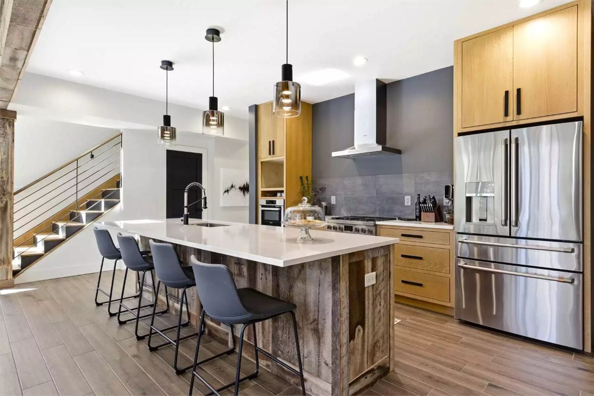 Reclaimed Wood Island Base Pairs with Quartz Counter in Modern Farmhouse Kitchen