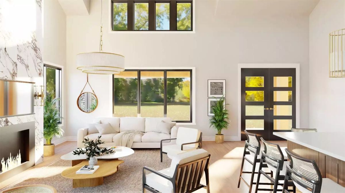 Soaring Ceilings and Gold Accents Define This Open Living Space