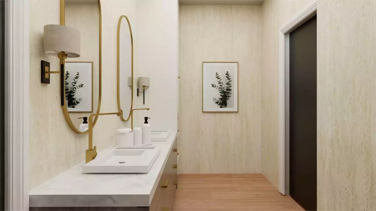 Gold Hardware and Oval Mirror Bring Quiet Luxury to This Powder Room