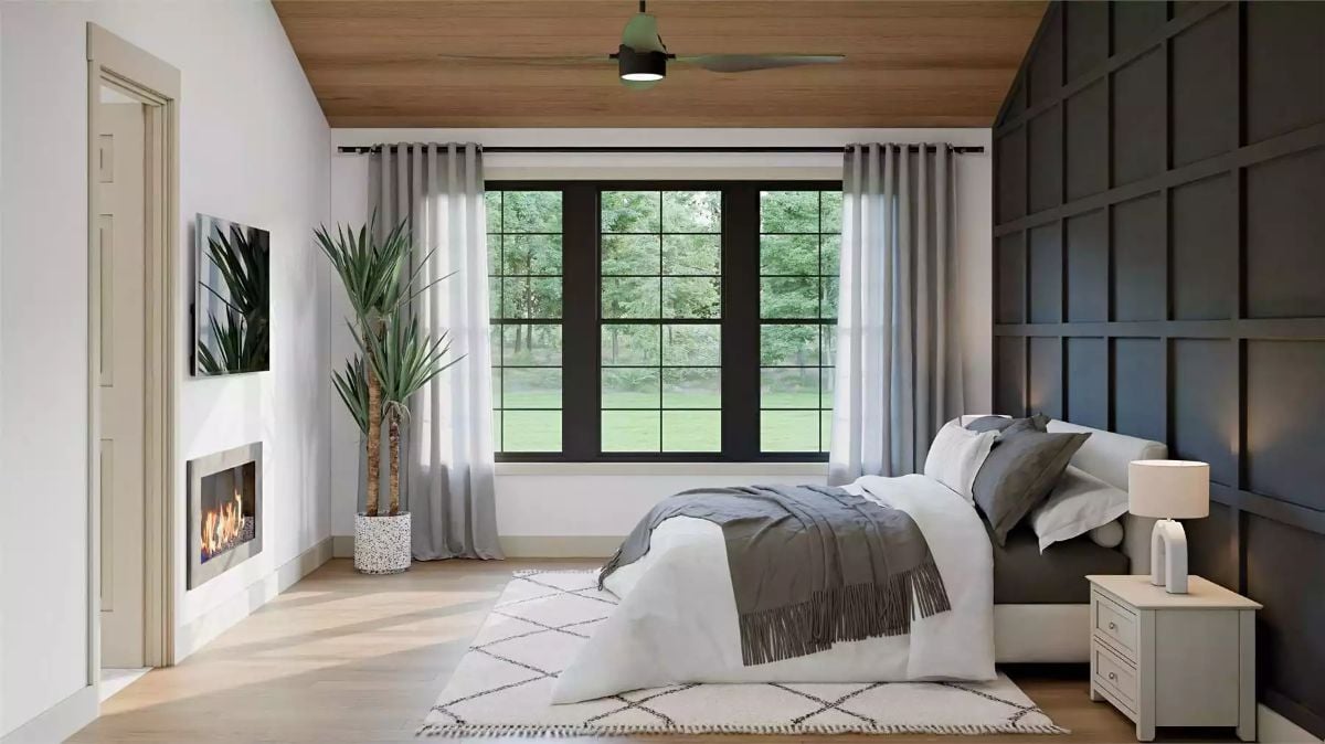 Wood Ceiling Planks and a Linear Fireplace Anchor This Craftsman Primary Bedroom