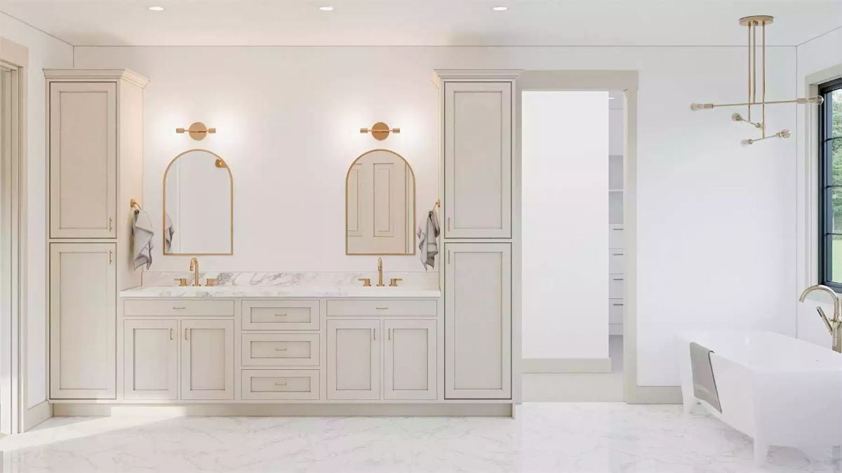 Gold Hardware and Arch Mirrors Bring Warmth to an All-White Double Vanity
