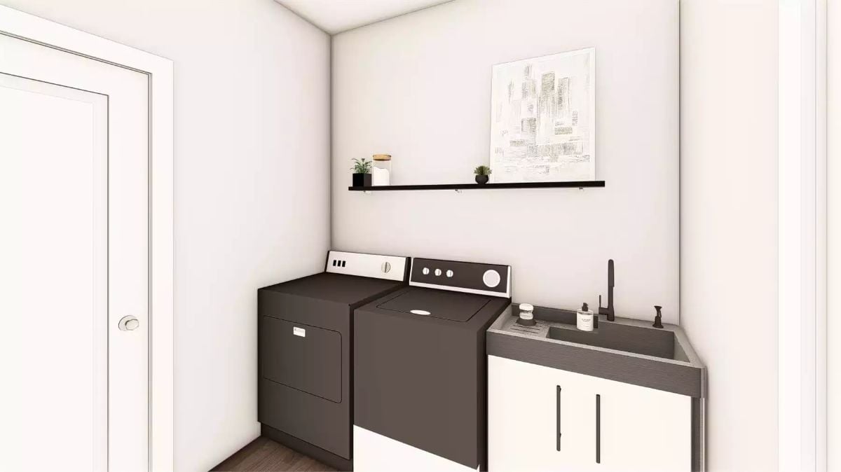 Matte Black Washer-Dryer Pair Anchors a Compact, Hardworking Laundry Room