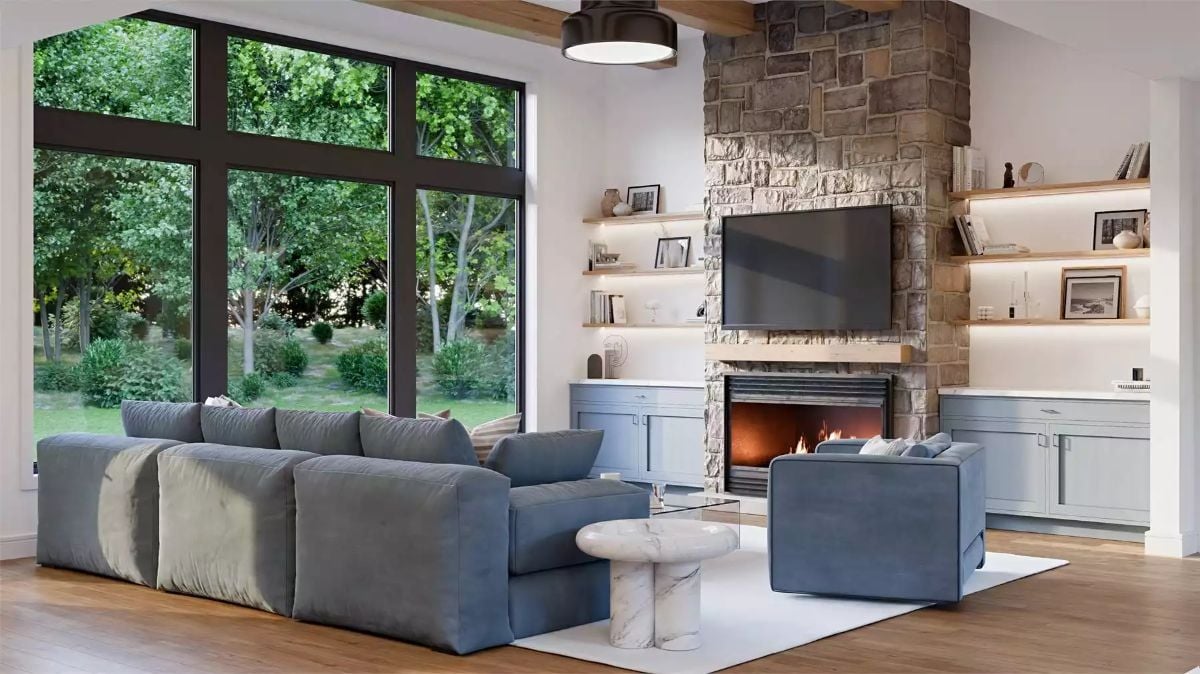 Slate Blue Seating and a Stone Fireplace Define a Living Room Built for Comfort