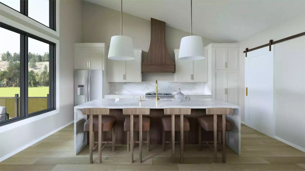 Marble Island, Wood Hood, and Brass Fixtures Define This Kitchen's Character