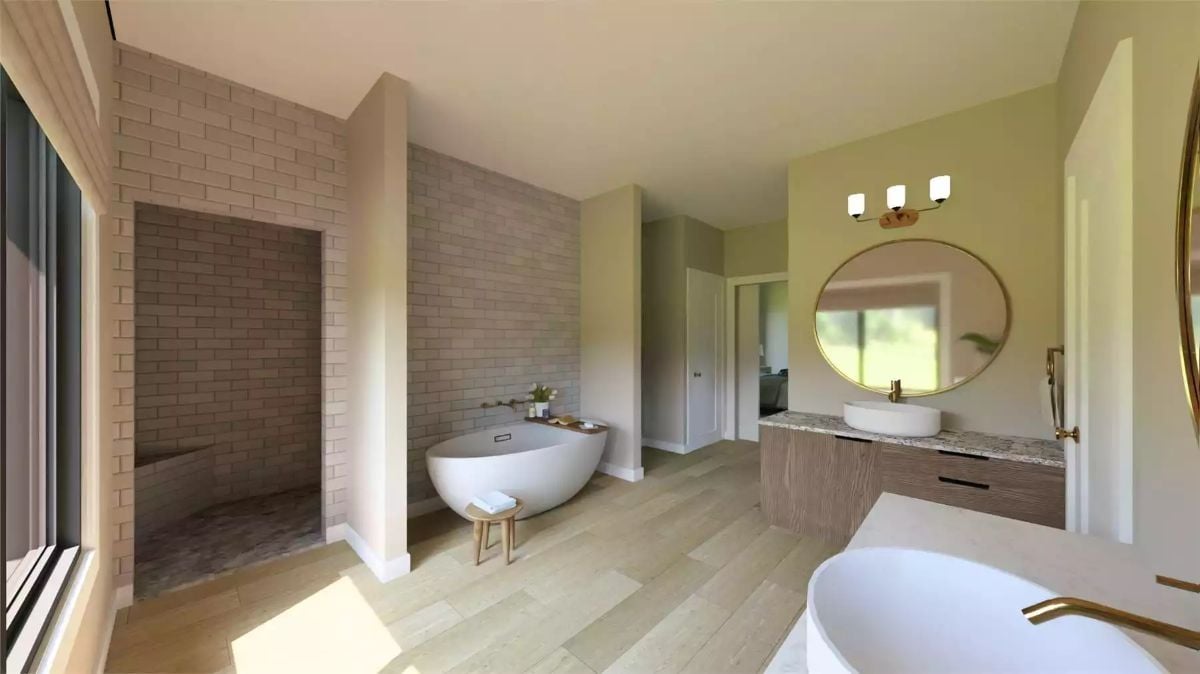 Freestanding Soaker, Brick Surround, and Vessel Sinks Shape a Spa-Like Primary Bath