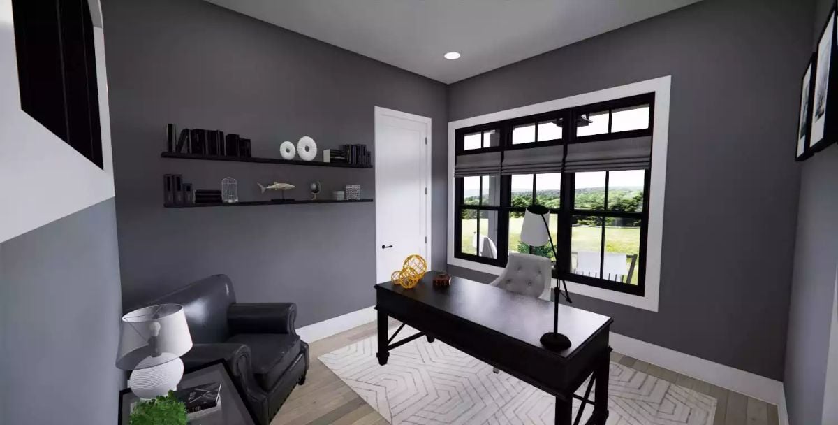 Dark Walls and Floating Shelves Give This Home Office a Focused, Grounded Feel