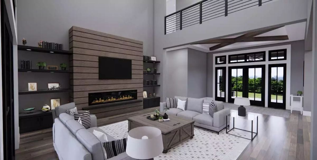 Soaring Ceilings and a Wood-Clad Fireplace Wall Define This Living Room
