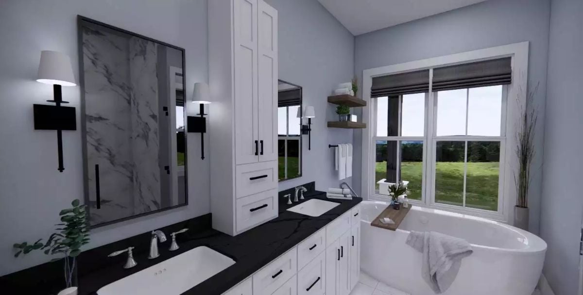 Black Countertops and a Freestanding Tub Make This Primary Bath Feel Polished