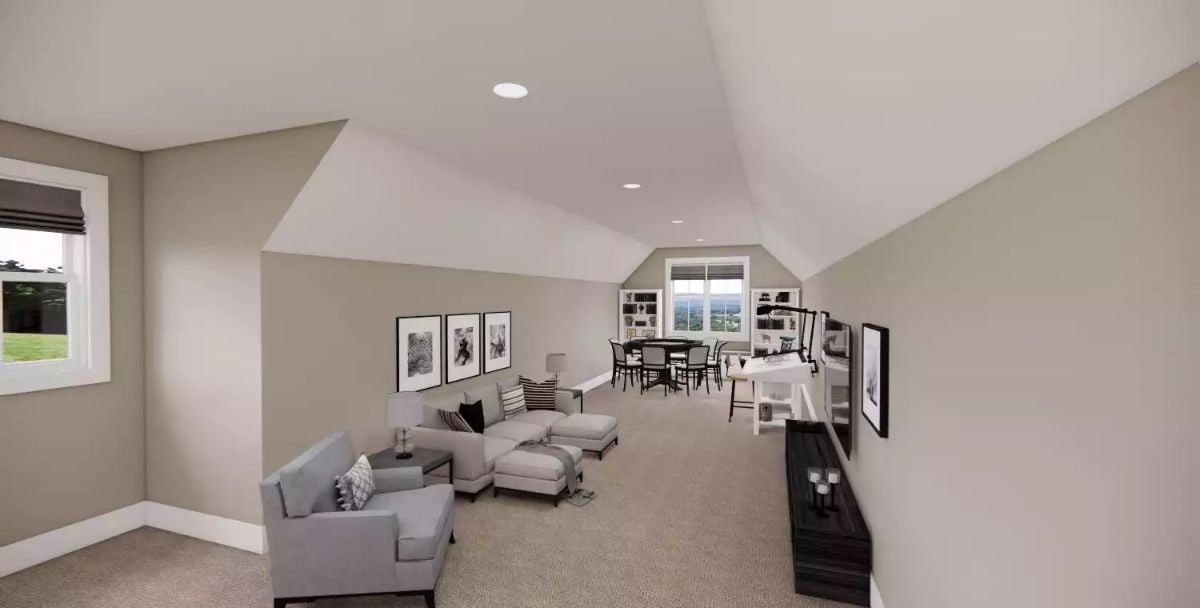 Vaulted Loft Space Balances Lounge Seating, a Work Desk, and a Game Table