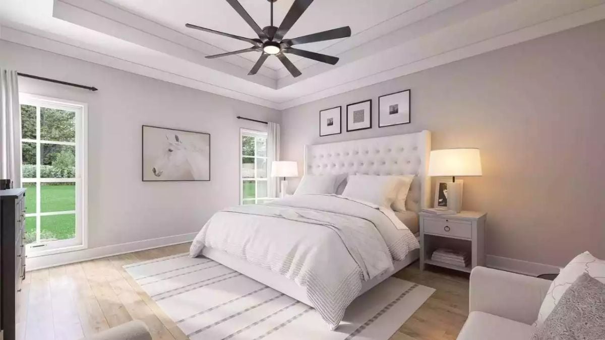 Tufted Headboard and Warm Lamplight Make This Master Bedroom Hard to Leave