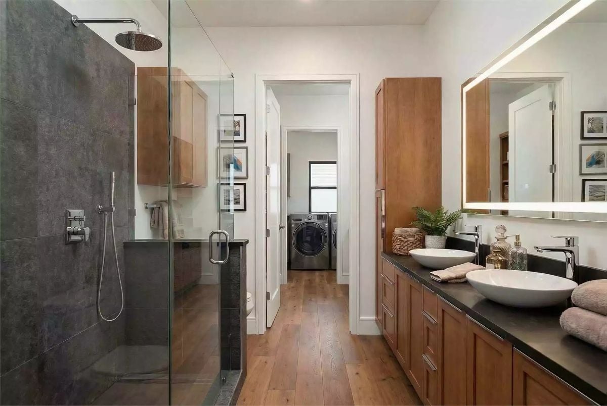 Vessel Sinks and Rain Shower Head Bring Spa Logic to a Compact Primary Bath