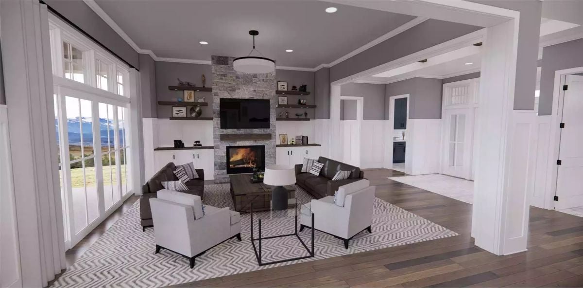 Warm Stone Fireplace Anchors an Open Living Room Built for Gathering