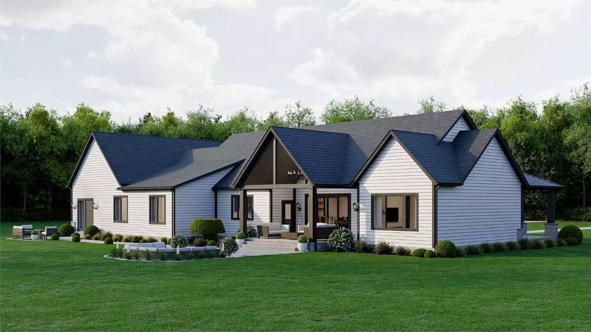 White Horizontal Siding and Dark Rooflines Define This Craftsman Rear Elevation