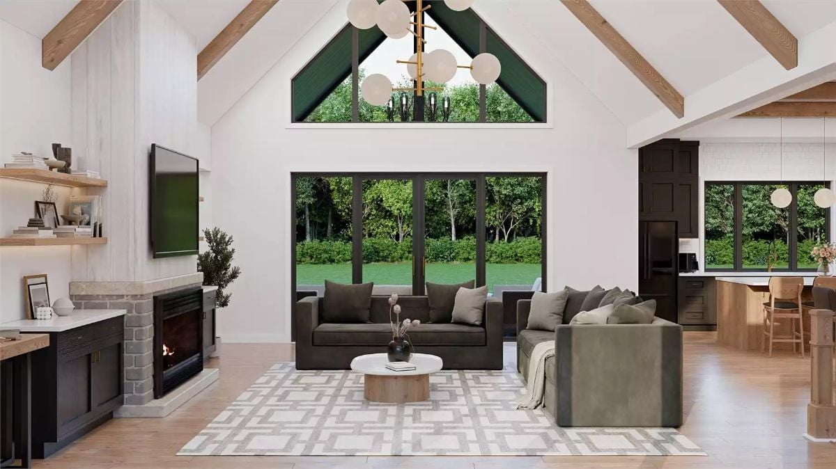 Vaulted Ceilings and Exposed Wood Beams Anchor an Open Craftsman Living Space