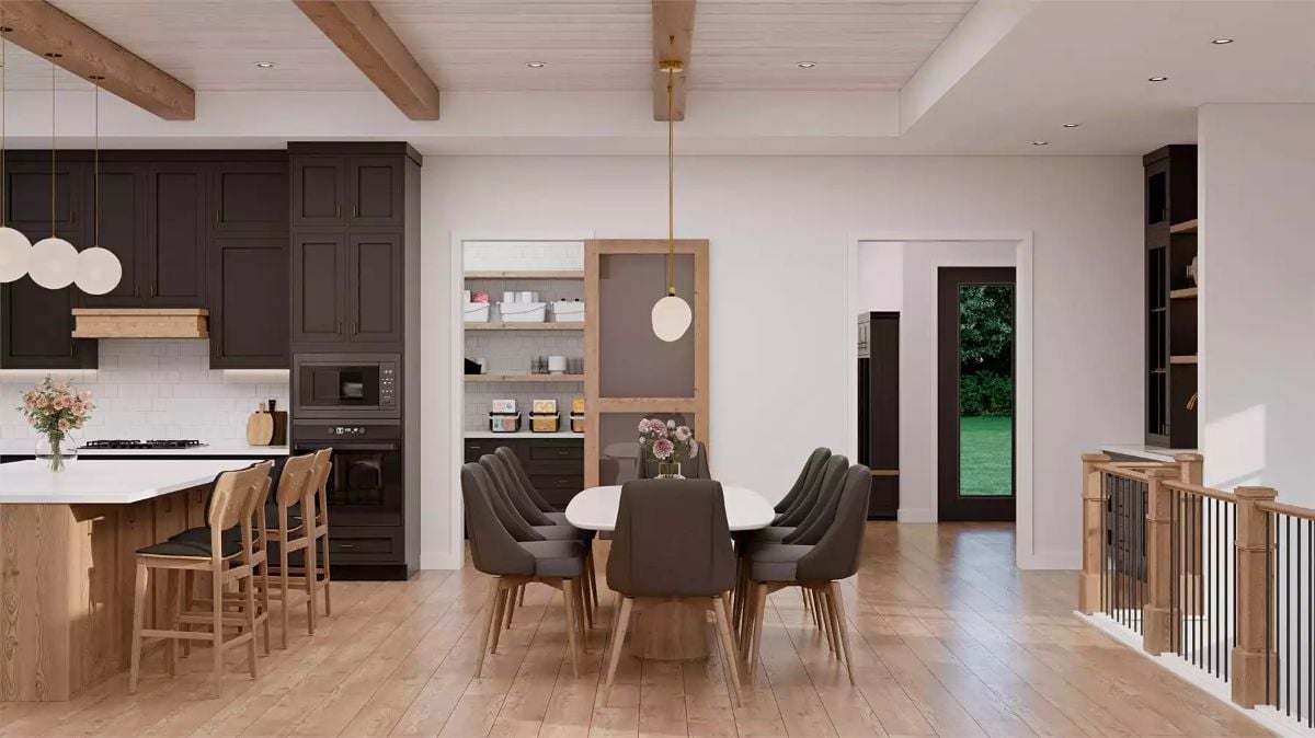 Dark Cabinets, Warm Wood, and an Open Plan Built for Gathering