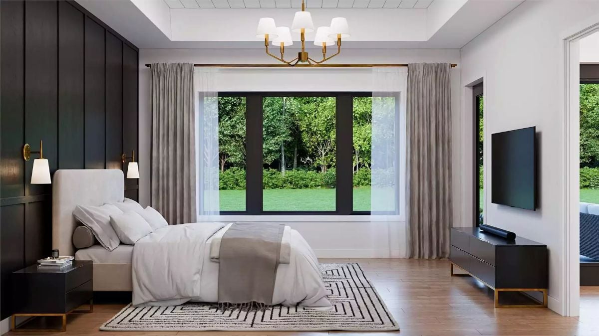 Brass Accents and Board-and-Batten Walls Give This Primary Bedroom Real Character