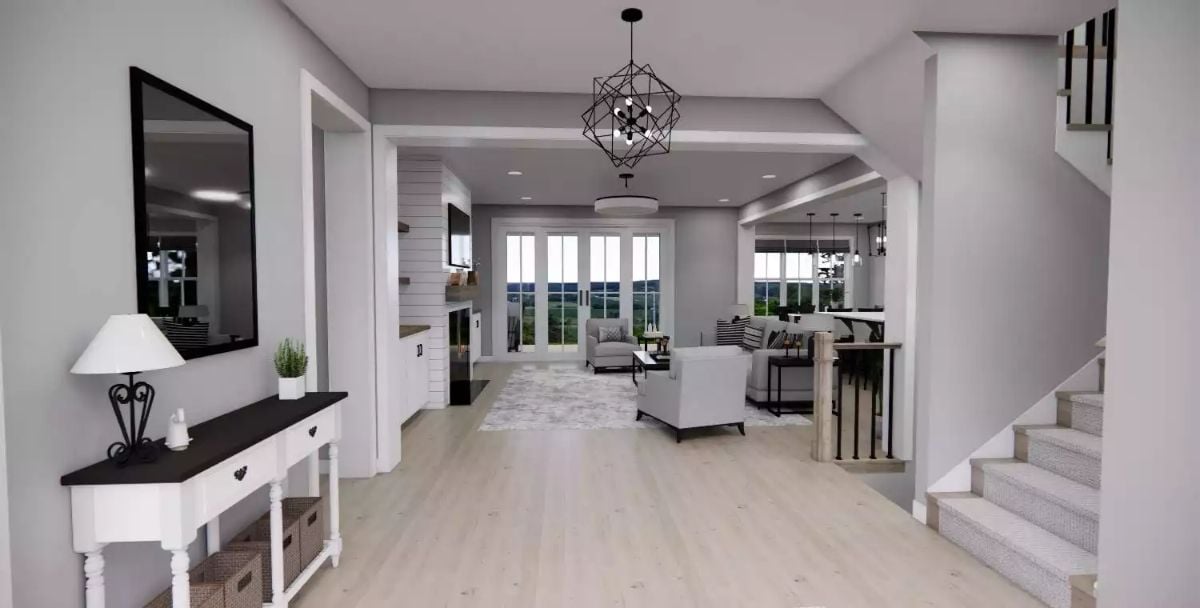 Geometric Pendant, Shiplap Fireplace, and French Doors Anchoring the Open Plan