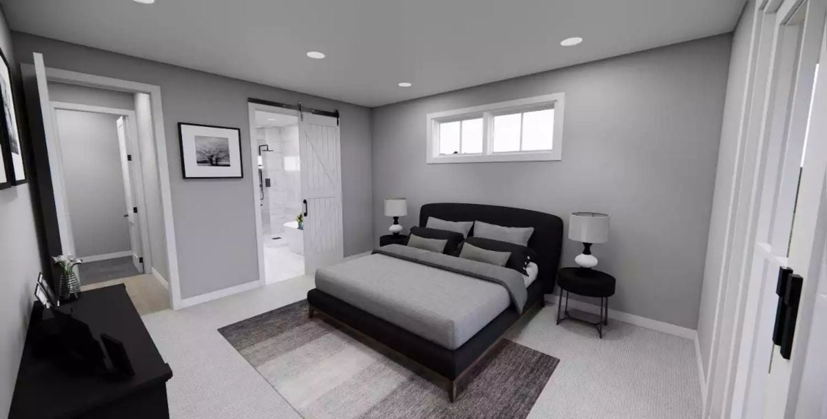 Barn Door, Low-Profile Bed, and Recessed Lighting Keeping It Clean