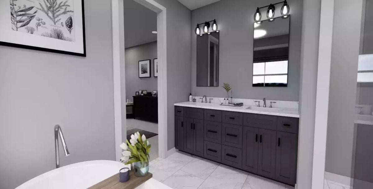 Double Vanity, Soaking Tub, and Industrial Sconces Making the Case for a Proper Primary Bath