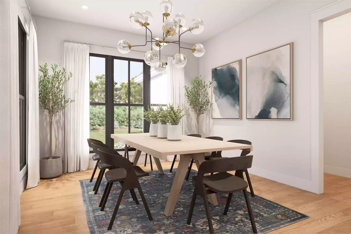 Globe Chandelier and Bleached Wood Table Set a Calm Dining Room Tone